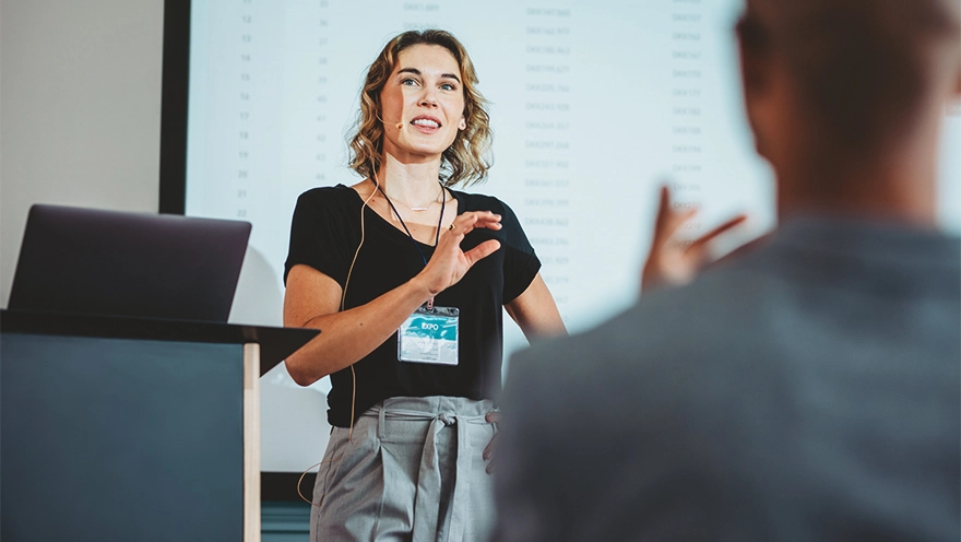 woman doing a certification training in front of a person woman doing a certification training in front of a person
